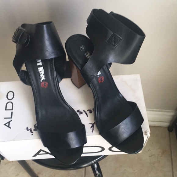 Size 9 Black open front, strapped high heeled silhouette. - Picture 2 of 4